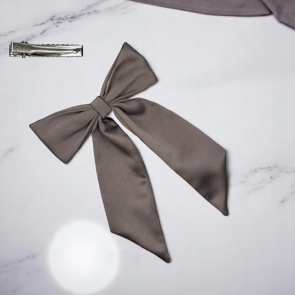 Tuhil Threads Taupe Royal Micro Satin Long Tail Bow. Luxurious satin hair bow for an elegant, chic accent. Shop Tuhil Threads hair accessories.