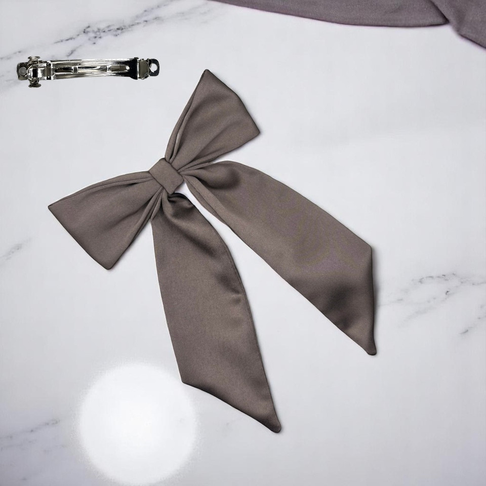 Tuhil Threads Taupe Royal Micro Satin Long Tail Bow. Luxurious satin hair bow for an elegant, chic accent. Shop Tuhil Threads hair accessories.