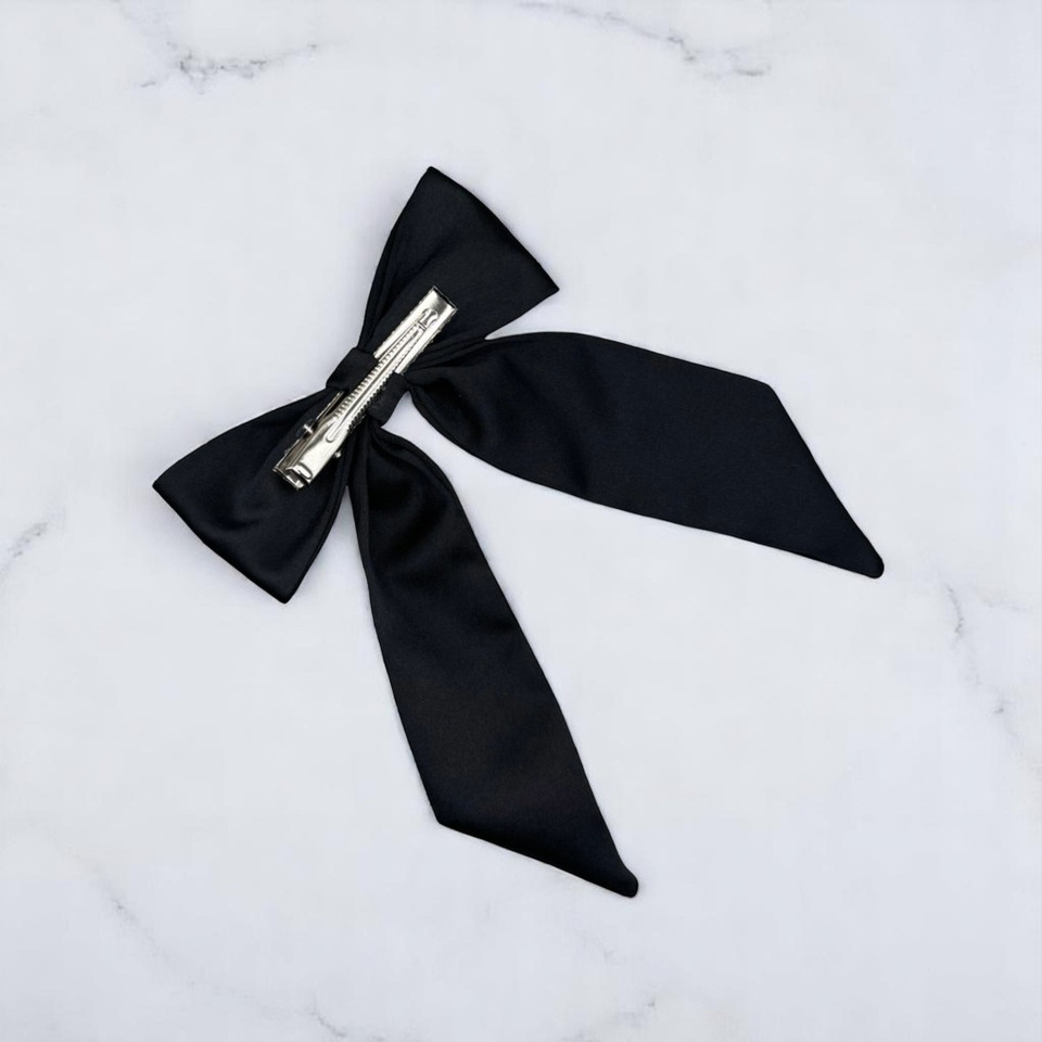 Tuhil Threads Black Royal Micro Satin Long Tail Bow. Luxurious satin hair bow for an elegant, chic accent. Shop Tuhil Threads hair accessories.