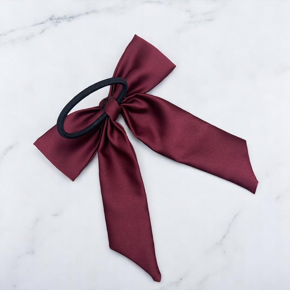 Tuhil Threads Burgundy Royal Micro Satin Long Tail Bow. Luxurious satin hair bow for an elegant, chic accent. Shop Tuhil Threads hair accessories.