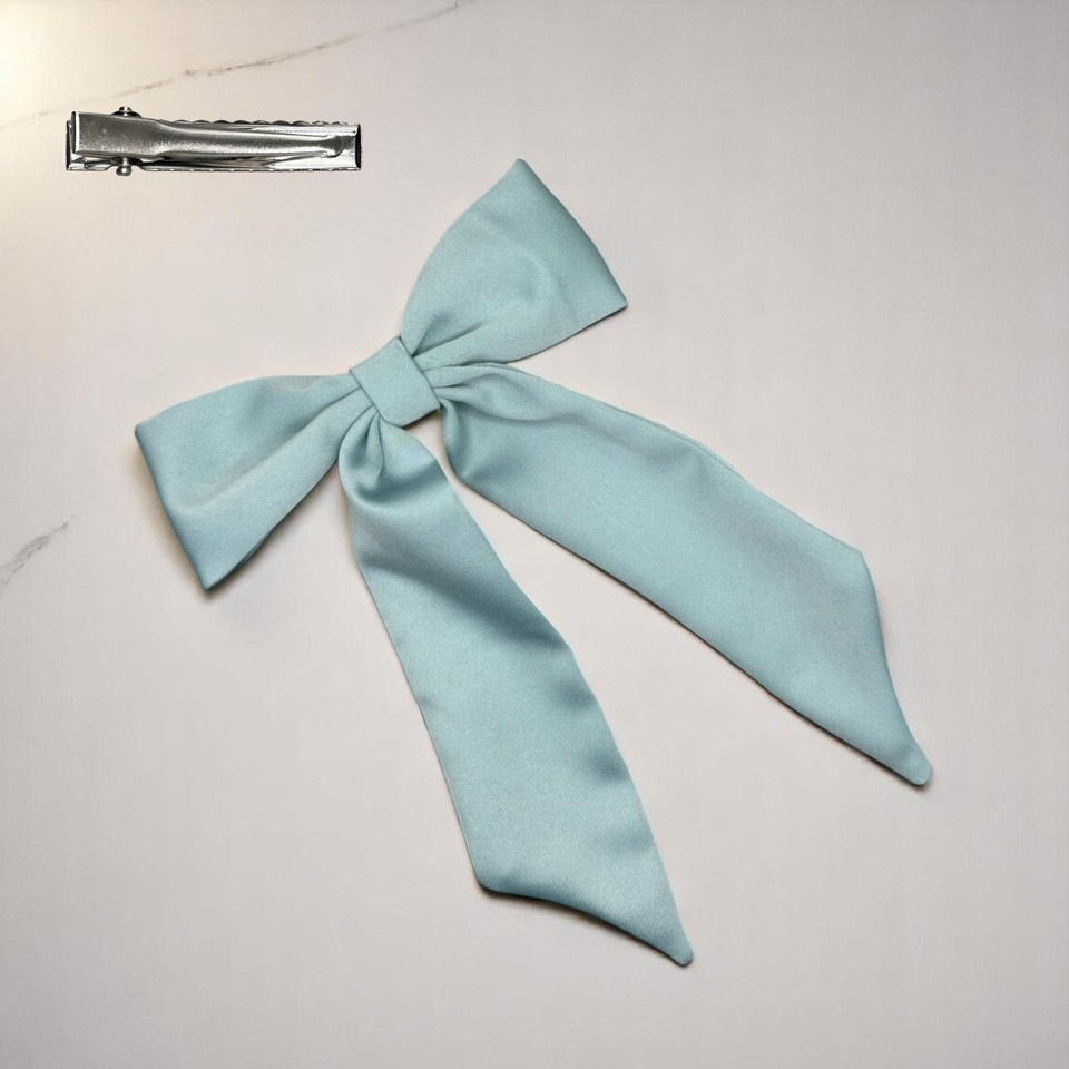 Tuhil Threads Mint Green Royal Micro Satin Long Tail Bow. Luxurious satin hair bow for an elegant, chic accent. Shop Tuhil Threads hair accessories.