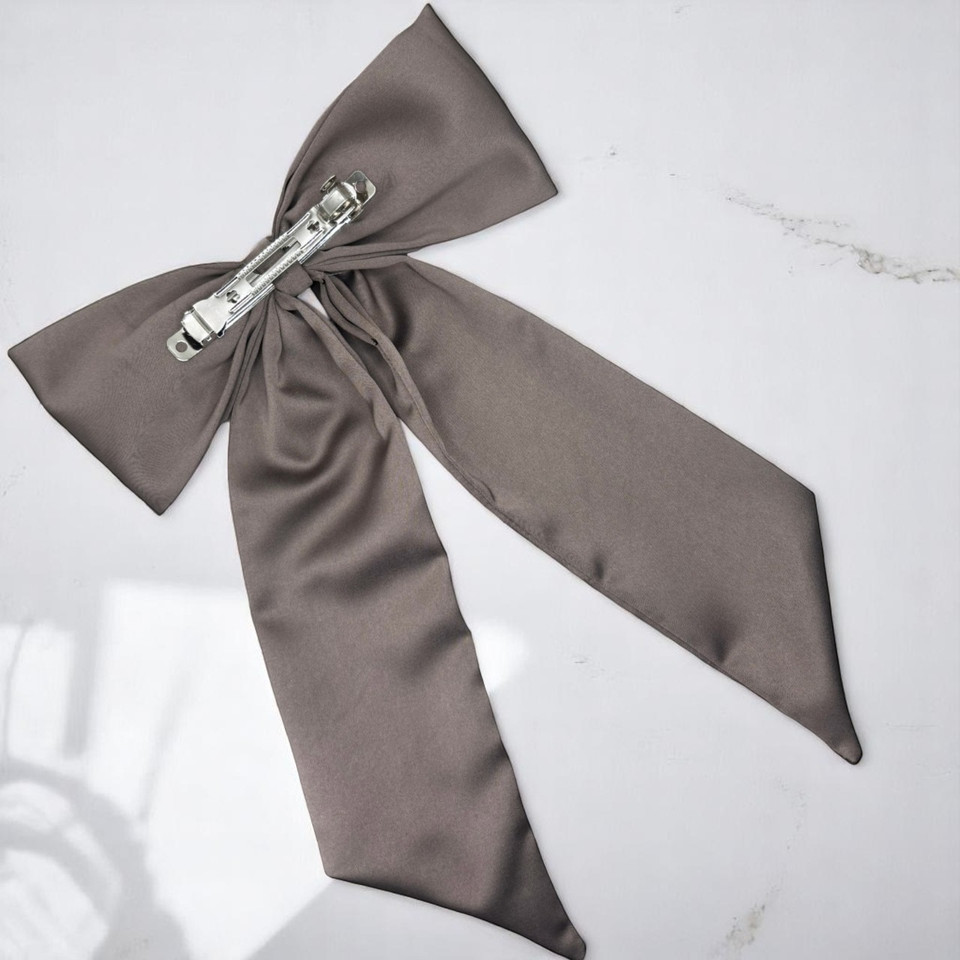 Tuhil Threads Taupe Royal Micro Satin Statement Long Tail Bow. Luxurious satin hair bow for an elegant, stylish accent. Shop Tuhil Threads hair accessories.