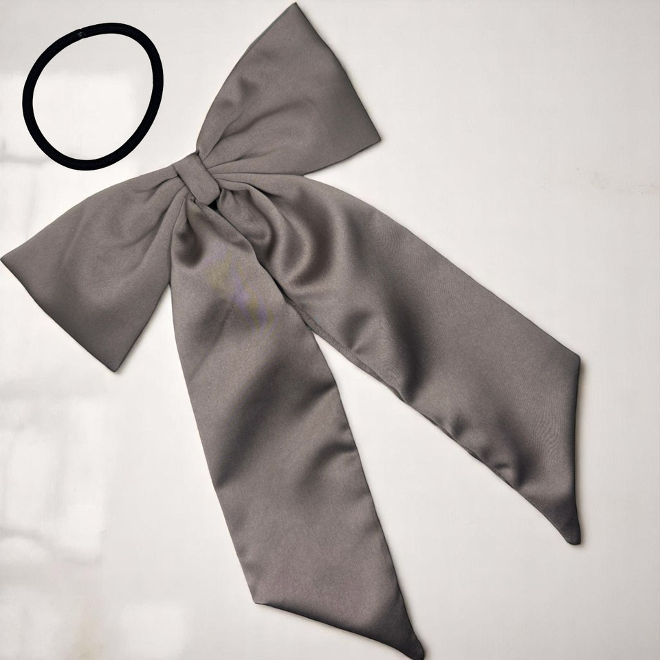 Tuhil Threads Taupe Royal Micro Satin Statement Long Tail Bow. Luxurious satin hair bow for an elegant, stylish accent. Shop Tuhil Threads hair accessories.