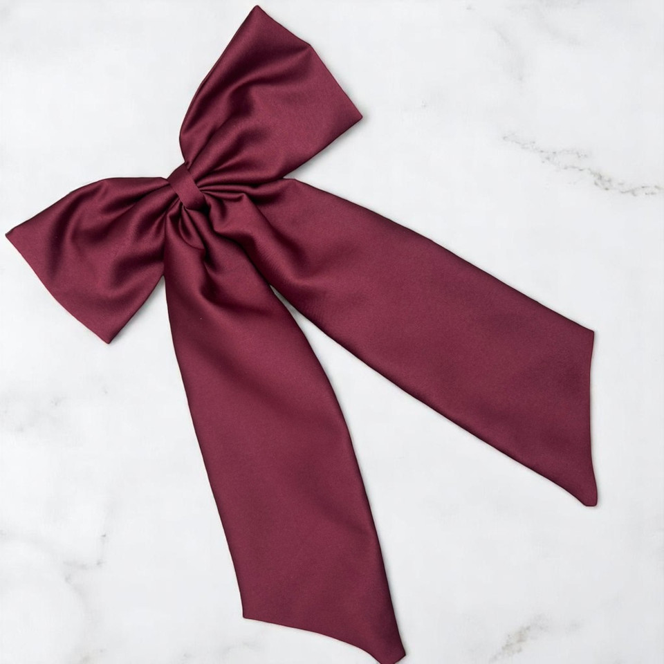 Tuhil Threads Burgundy Royal Micro Satin Statement Long Tail Bow. Luxurious satin hair bow for an elegant, stylish accent. Shop Tuhil Threads hair accessories.