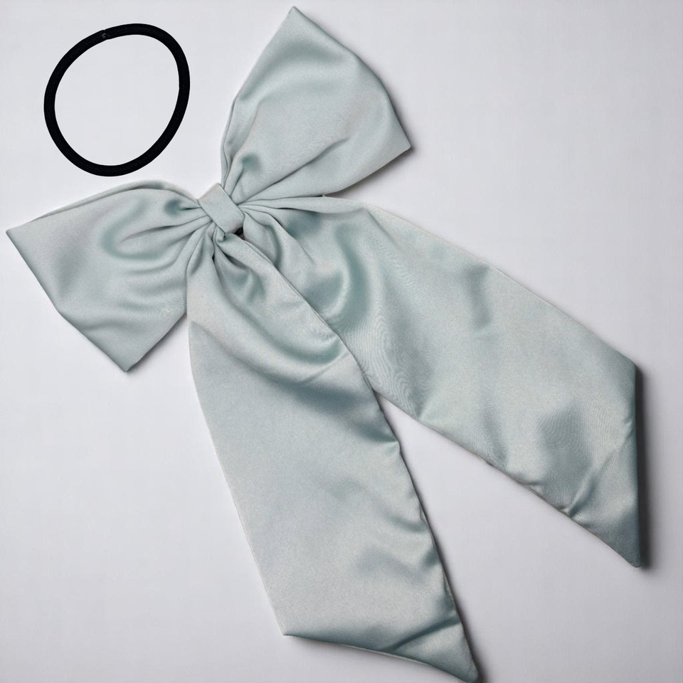Tuhil Threads Mint Green Royal Micro Satin Statement Long Tail Bow. Luxurious satin hair bow for an elegant, stylish accent. Shop Tuhil Threads hair accessories.