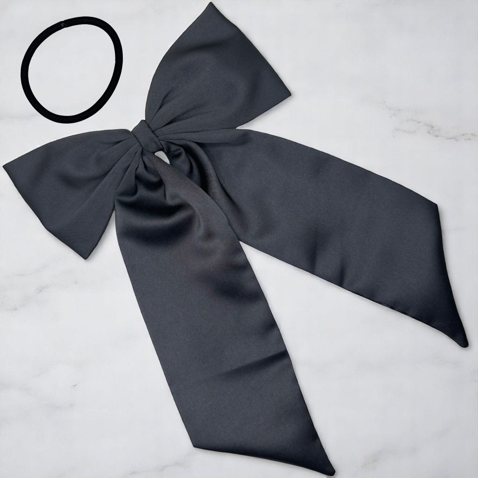 Tuhil Threads Black Royal Micro Satin Statement Long Tail Bow. Luxurious satin hair bow for an elegant, stylish accent. Shop Tuhil Threads hair accessories.