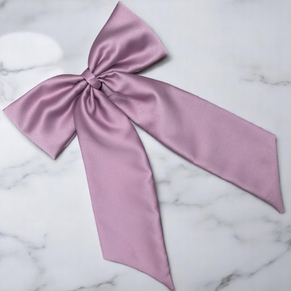 Tuhil Threads Lilac Royal Micro Satin Statement Long Tail Bow. Luxurious satin hair bow for an elegant, stylish accent. Shop Tuhil Threads hair accessories.