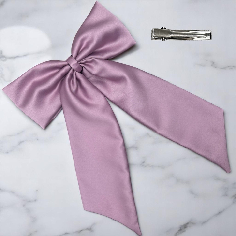 Tuhil Threads Lilac Royal Micro Satin Statement Long Tail Bow. Luxurious satin hair bow for an elegant, stylish accent. Shop Tuhil Threads hair accessories.