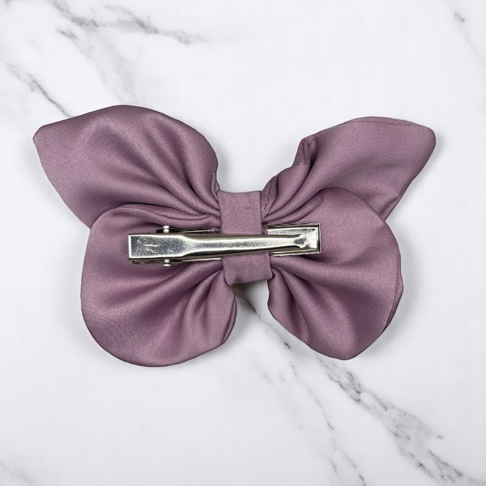 Tuhil Threads small lilac Royal Micro Satin butterfly bow  showcasing its classic colour and elegant shape. Shop Tuhil Threads hair accessories.