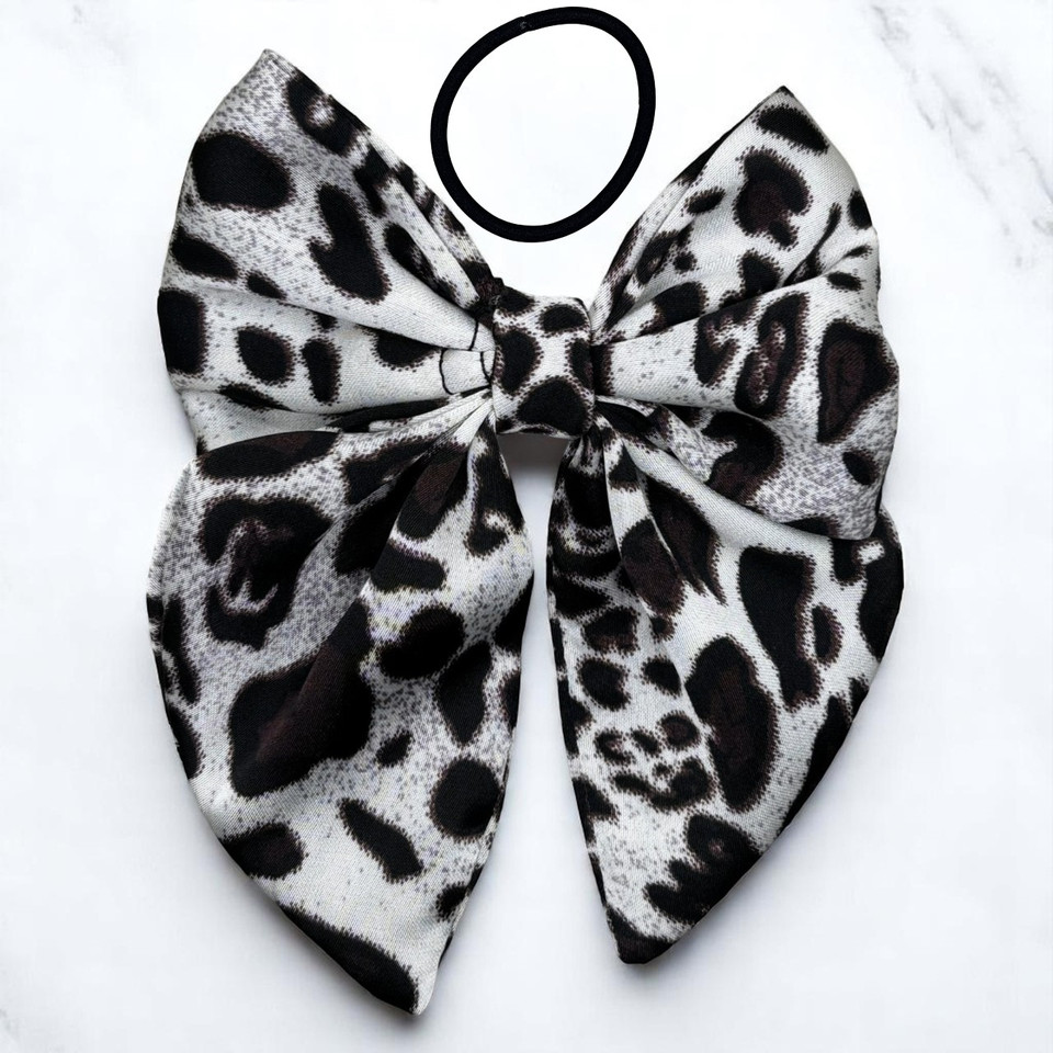 A stylish Spotted Black and Grey Style Medium Silky Satin Pigtail Bow by Tuhil Threads, measuring 10cm x 12cm. Shop Tuhil Threads hair accessories. A stylish Spotted Black and Grey Style Medium Silky Satin Pigtail Bow by Tuhil Threads, measuring 10cm x 12cm. Shop Tuhil Threads hair accessories.