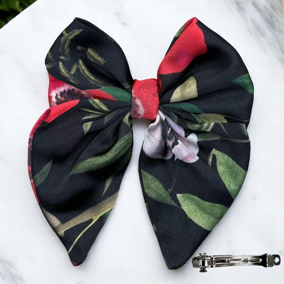 A beautiful Midnight Garden Floral Medium Silky Satin Pigtail Bow by Tuhil Threads, measuring 10cm x 12cm. Shop Tuhil Threads hair accessories. A beautiful Midnight Garden Floral Medium Silky Satin Pigtail Bow by Tuhil Threads, measuring 10cm x 12cm. Shop Tuhil Threads hair accessories.