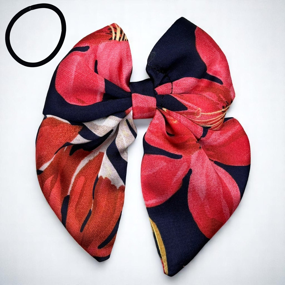 A striking Crimson Bloom Medium Silky Satin Pigtail Bow by Tuhil Threads, measuring 10cm x 12cm. Shop Tuhil Threads hair accessories. A striking Crimson Bloom Medium Silky Satin Pigtail Bow by Tuhil Threads, measuring 10cm x 12cm. Shop Tuhil Threads hair accessories.