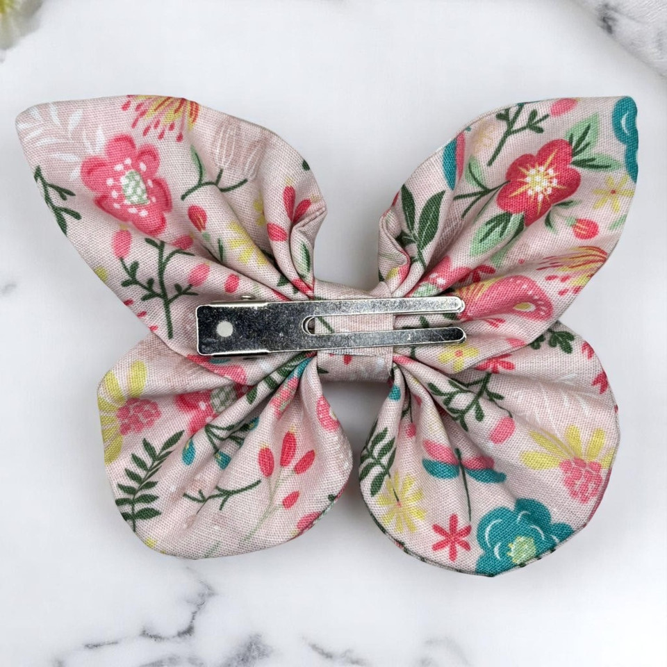 An elegant Rose Garden Floral Medium Cotton Butterfly Bow by Tuhil Threads, measuring approximately 12cm wide by 8cm high. Shop Tuhil Threads hair accessories.