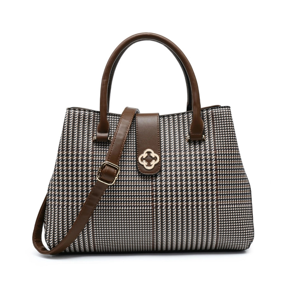 Handbag with Zip Top Section and Flap Over Buckle, featuring a stylish black and white houndstooth pattern, available at Tuhil Threads. Handbag with Zip Top Section and Flap Over Buckle, featuring a stylish black and white houndstooth pattern, available at Tuhil Threads.