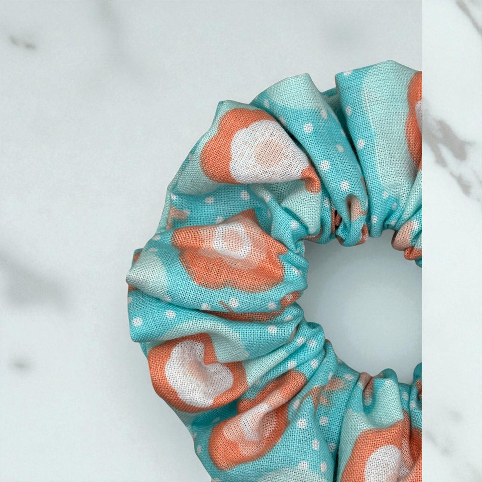 Aqua Bloom Peach PolyCotton Scrunchie. Shop Tuhil Threads hair accessories. Aqua Bloom Peach PolyCotton Scrunchie. Shop Tuhil Threads hair accessories.