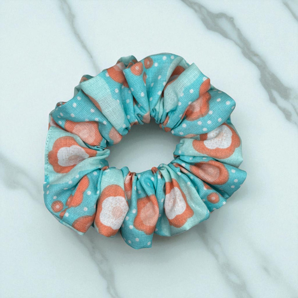 Aqua Bloom Peach PolyCotton Scrunchie. Shop Tuhil Threads hair accessories. Aqua Bloom Peach PolyCotton Scrunchie. Shop Tuhil Threads hair accessories.