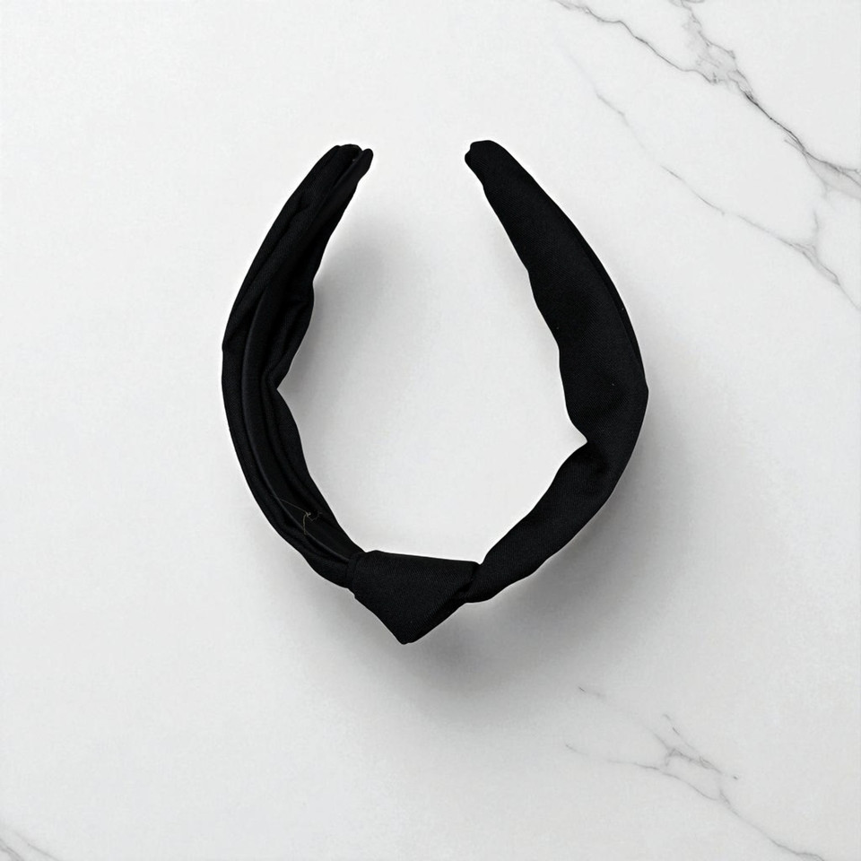 Black knotted fabric aliceband. Shop at Tuhil Threads. Black knotted fabric aliceband. Shop at Tuhil Threads.