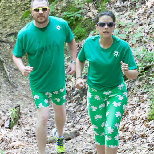 Special 8" shorts in our shamrock print. White four leaf clovers on green background.