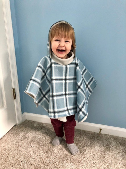 Plaid poncho with blue and black Plaid poncho with blue and black