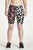 Half and half shorts. Shown half polka riot and half black and white dots