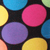 Multi colored polka dots (all the same size) on black fabric