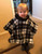 Toddler Poncho shown in black and white plaid.