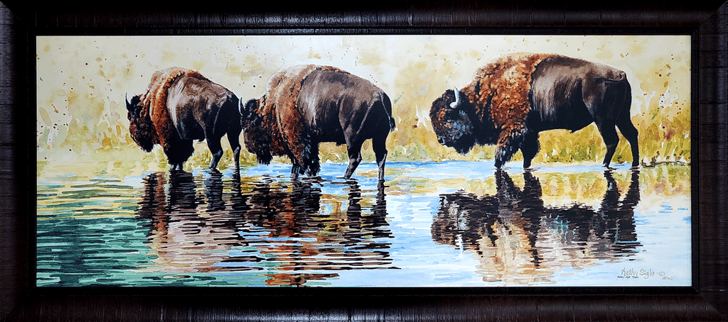 Framed giclée print on canvas, "Crossing Over," by Kathy Sigle shows three bison on a riverbank.