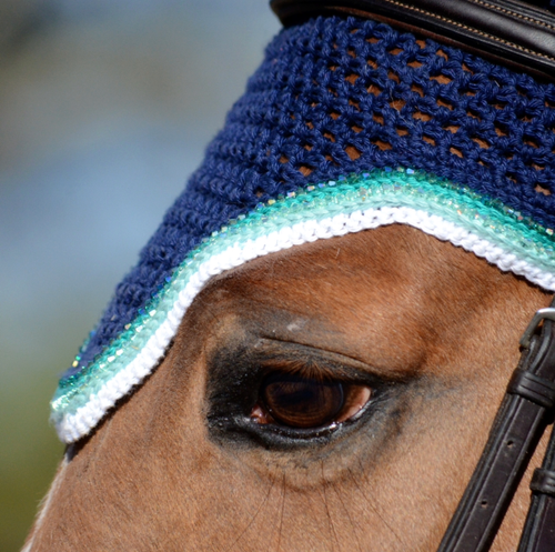 Upperville style shown in a navy base, with emerald, sea foam and snow trims, and two strands of matching beads.