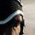 Old Dominion style fly bonnet shown in a night base, with gold glitter and snow trims, and two strands of matching beads.