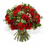 Ruby red roses, romantic carnations and crimson alstroemeria allude to a passionate devotion of love.