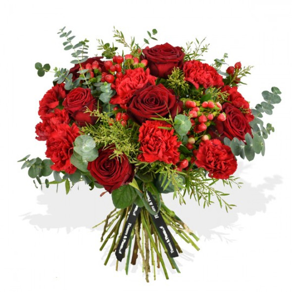 red roses and carnations flower arrangement