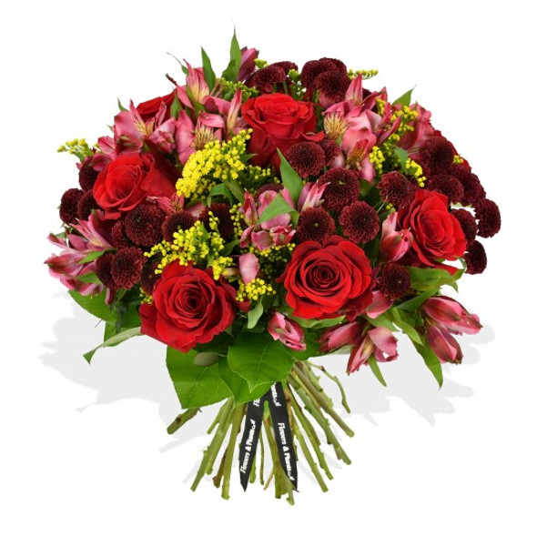 Fresh roses, alstroemeria, chrysanthemum and solidago all embrace this bouquet