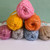Light, soft and fluffy, Serene Tweed is a funky chainette yarn made from 53% Polyester and 47% Acrylic. Each 100g ball has a yardage of 200m, and requires 7mm hooks and needles to work with. Serene Tweed is hand wash only.