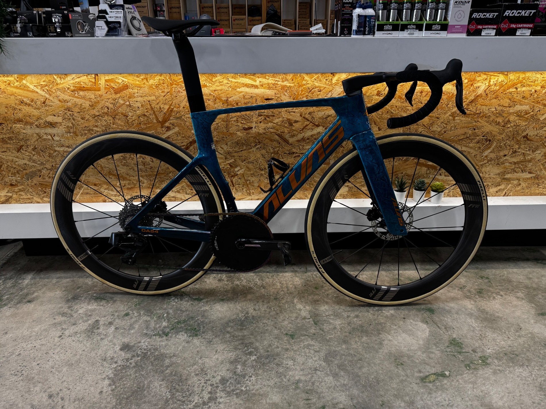 Custom blue and bronze Alvas DA54 aero carbon road bike built by Nextbike Balcatta Perth