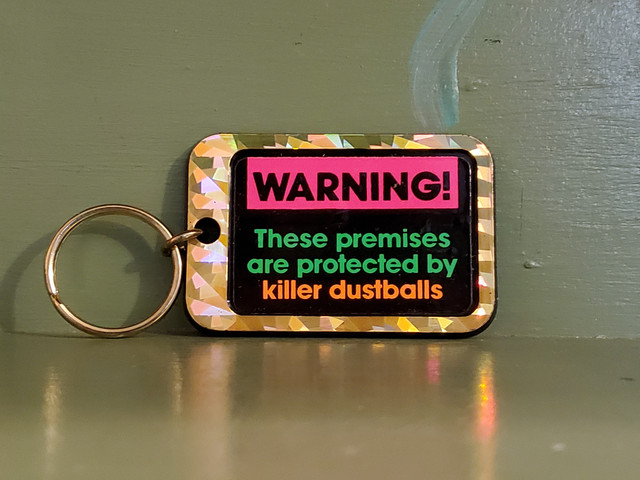 Vintage Funny Warning Killer Dust keychain
