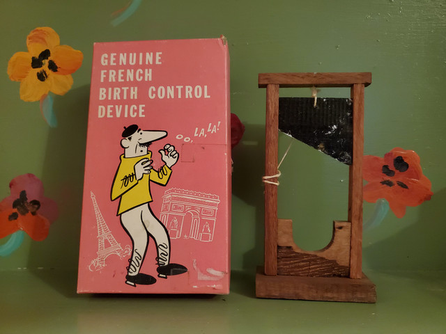 Vintage funny French Birth Control Penis guillotine gag box