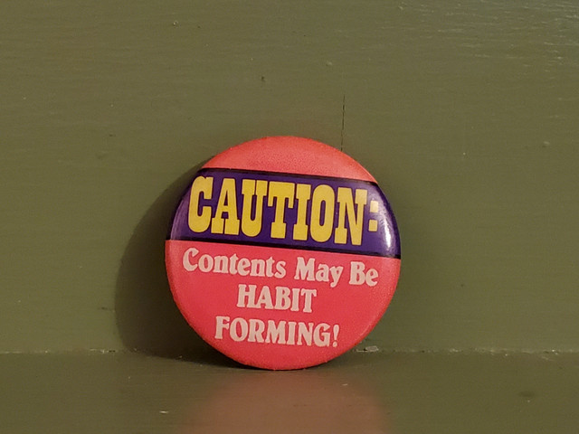 Vintage Caution Habit Forming Pinback button