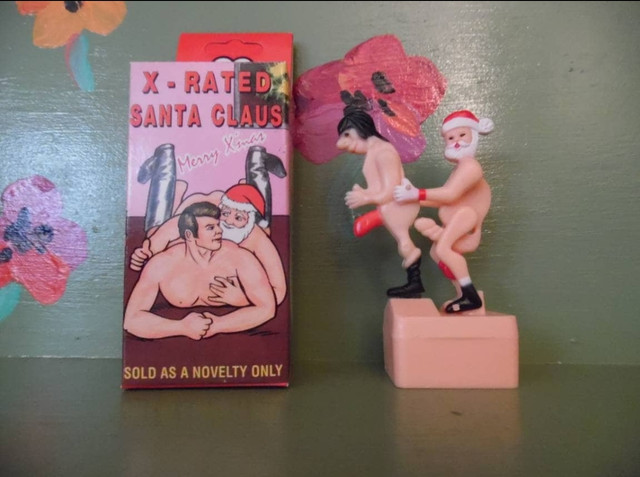 Vintage Gay Santa humping wind up toy