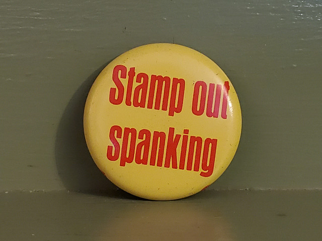 stamp out spanking pin button