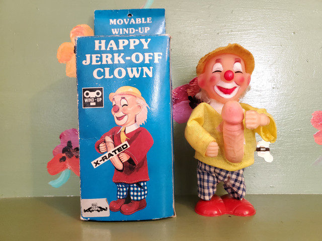 Wind Up Masturbating Clown jerk off penis Toy