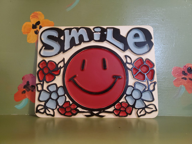 vacuform sign smiley face flowers