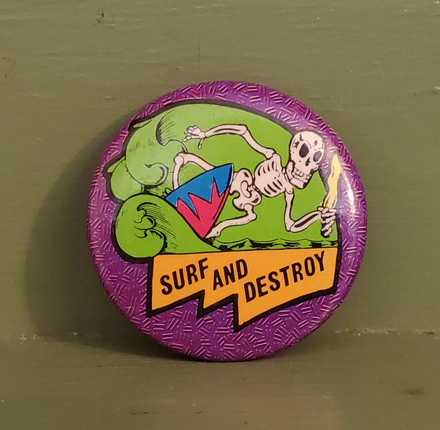 Surf and destroy skeleton pin button