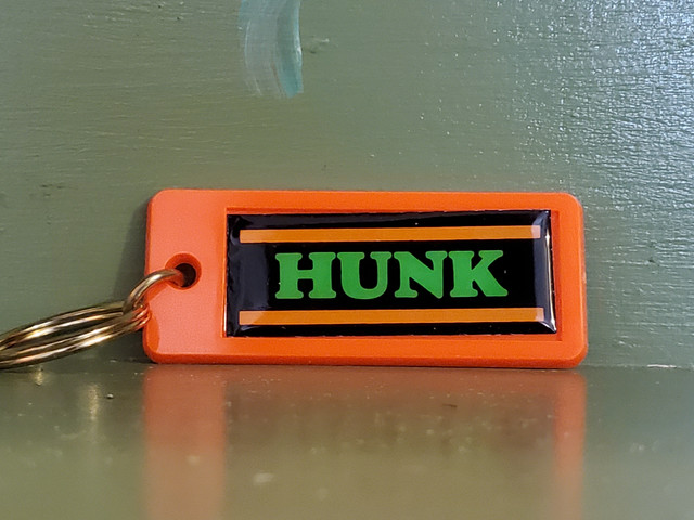 Vintage neon hunk keychain