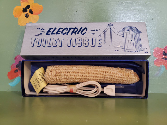 Vintage electric toilet paper corn cob plug gag box