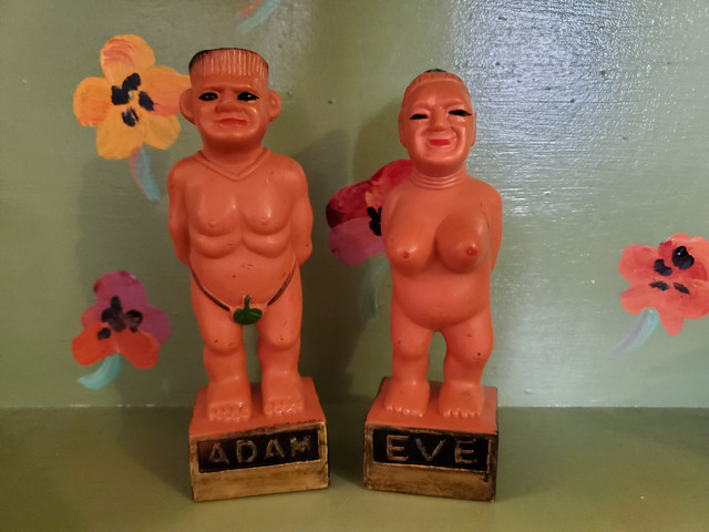 Vintage Adam and Eve Nude statues apple club