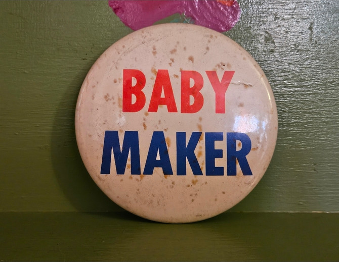 Vintage pinback button baby maker