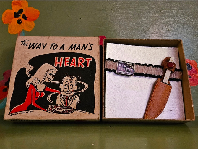 Vintage way to a man's heart garter knife