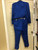 Blue traje with tan Suede Grecca