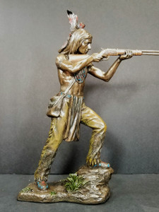 INDIAN WARRIOR STANDING AND SHOOTING RIFLE