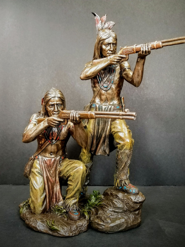 INDIAN WARRIOR KNEELING AND SHOOTING RIFLE